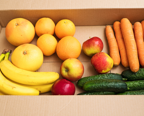 Cardboard Box With Fruits And Vegetables.